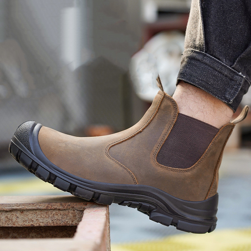 Chelsea Boots Men - ผู้ชายขนาดใหญ่แฟชั่น Steel Toe ครอบคลุมรองเท้าทํางานหนังวัวความปลอดภัยรองเท้าสีดําสีน้ําตาล WORKER เชลซี